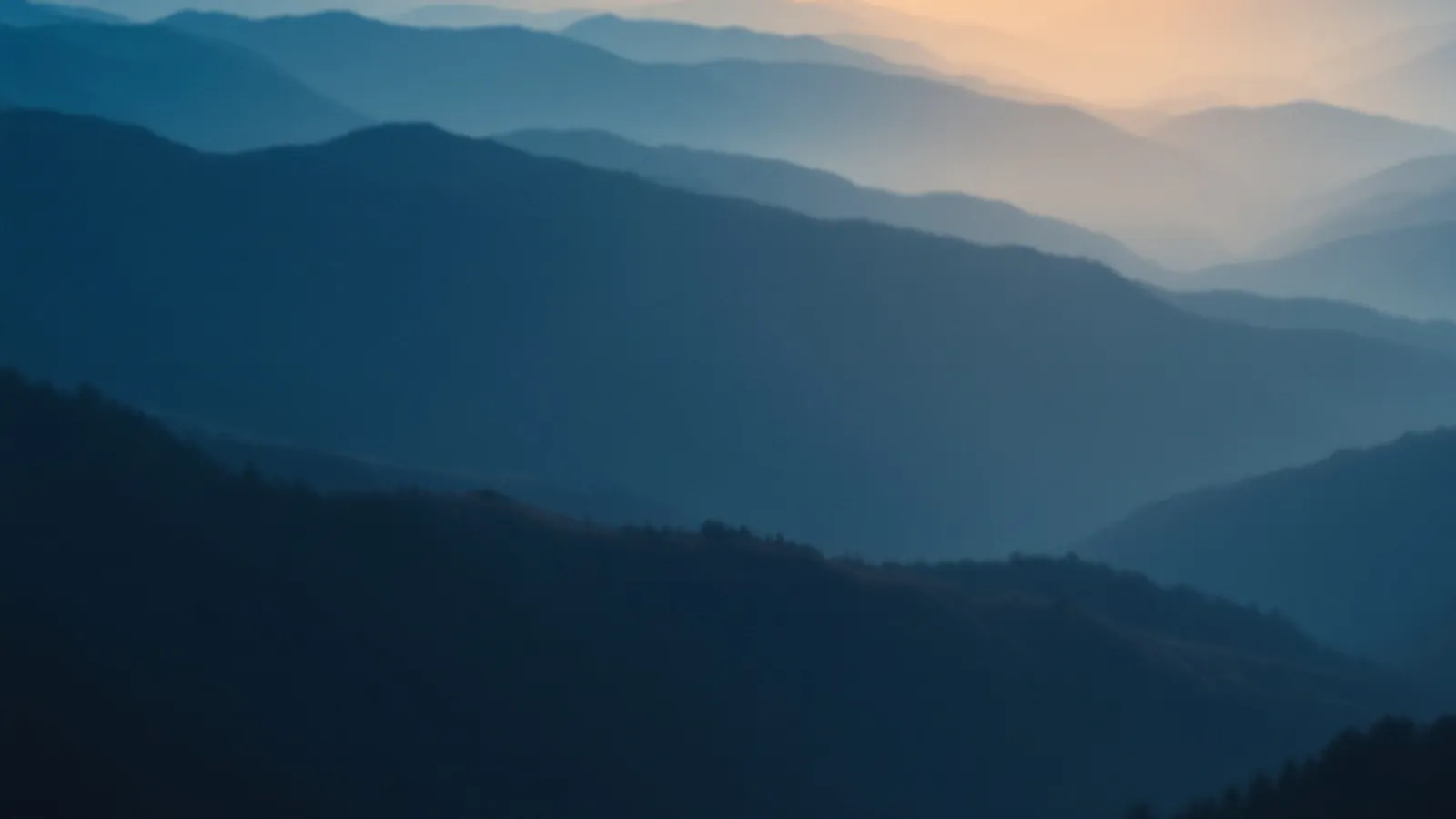 Layered blue hills in soft dawn mist, the DawnLumo view of online loans with fast decisions, $100 – $5,000